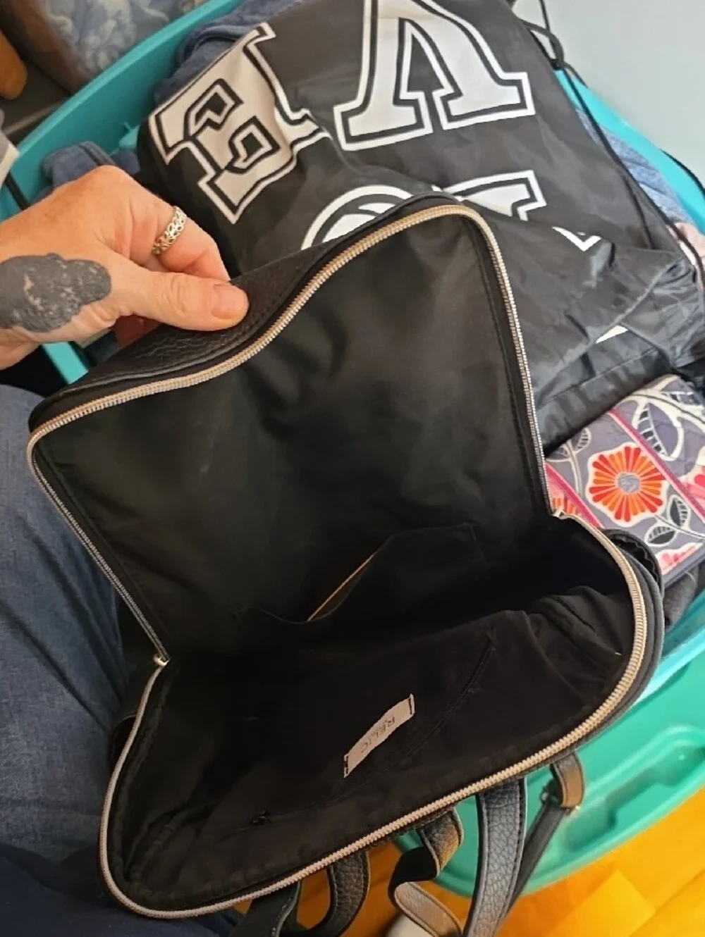 Relic Black Pebbled Faux-Leather Backpack with Gold Hardware